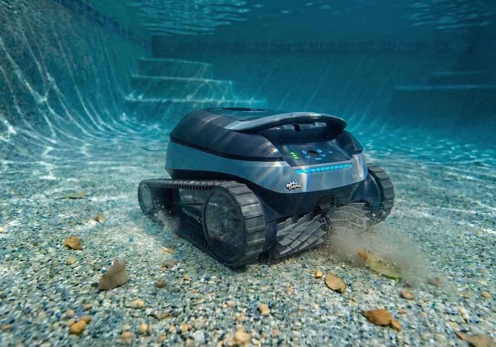 Dolphin Nautilus EON 120D cleaning a pebble pool floor with no cable