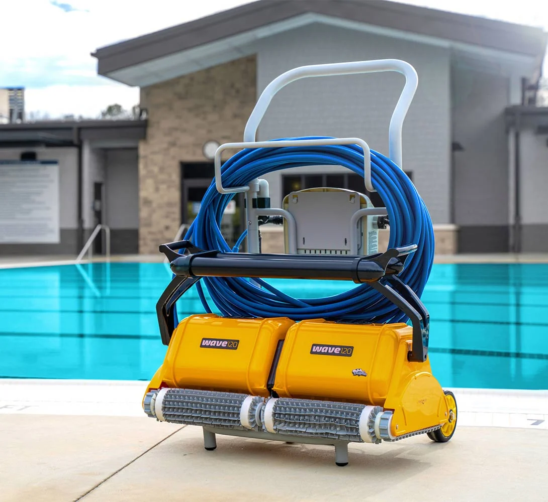 Dolphin Wave 120 on its caddy at a commercial pool
