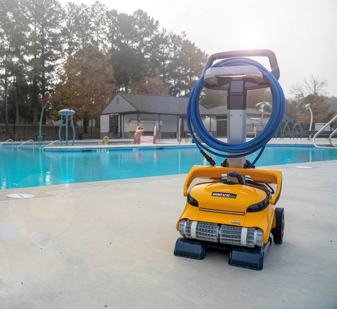 Dolphin Wave 60 on its caddy at a community pool